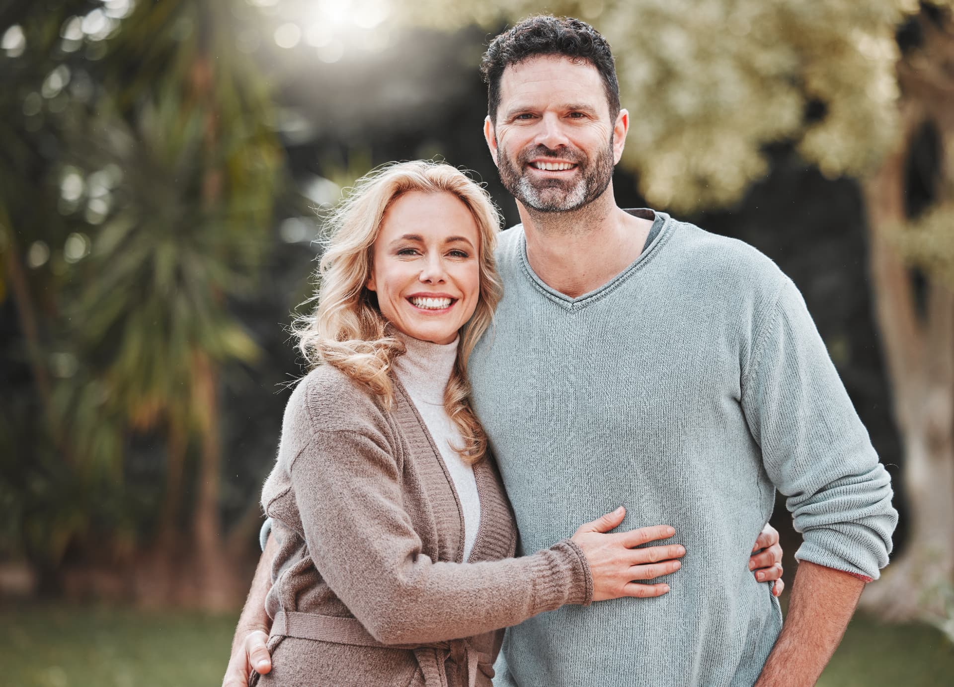Couple embracing outdoors
